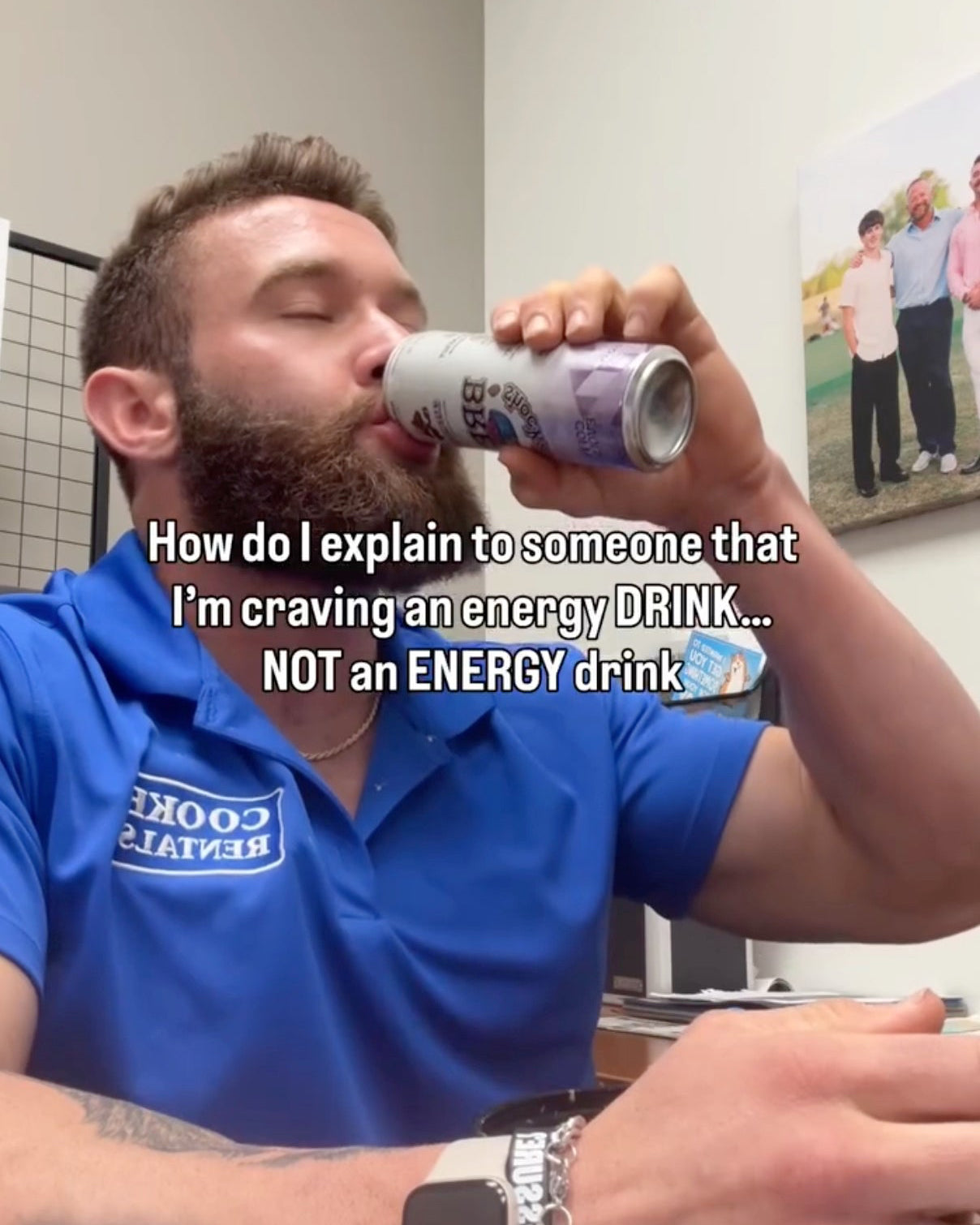 Man in blue shirt drinking from a can with text overlay